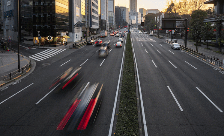 Do you really need gigabit internet - few cars on a highway with buildings in the background.